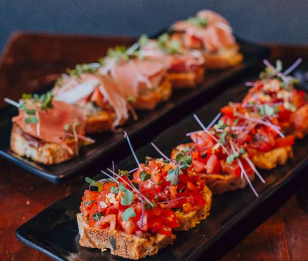 Bruschettas de tomatinhos grape